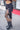 Black Ruffle Long Skirt, side view showing gathered fabric and ruffled hem