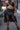Black Runic Chinatsu Ruffle Skirt with tiered ruffles, front view