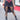Black Ruffle Long Skirt with adjustable front cinch and ruffled hem, modeled outdoors